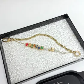 Louis Vuitton LV double chain bead pendant letter gold-decorated belt chain and bag decoration short version-3561  